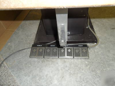Buy hydraulic exam table and get reg. exam table free 
