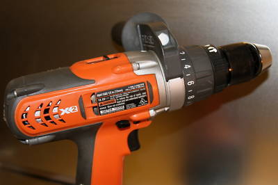 Rigid X2 18V hammer drill with charger and bag