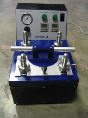 Normec automatic sheet press