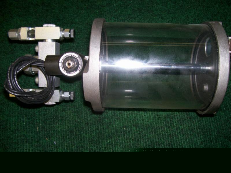 Oil -rite air operaterd spray dispenser