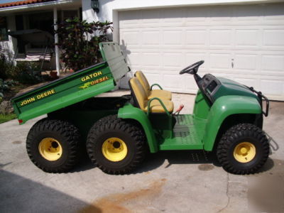 New diesel gator 6X4 w/power dump bed 145 hours since 