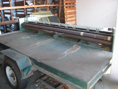 E-215 groovemaster duct board machine