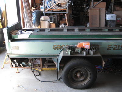 E-215 groovemaster duct board machine