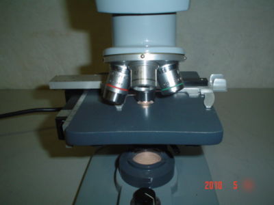 American optical lighted microscope w/dust cover #1 umc