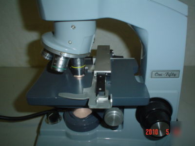 American optical lighted microscope w/dust cover #1 umc