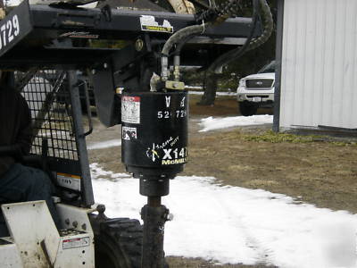 Bobcat 742 b with backhoe and auger