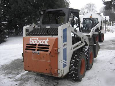 Bobcat 742 b with backhoe and auger