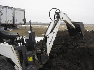 Bobcat 742 b with backhoe and auger