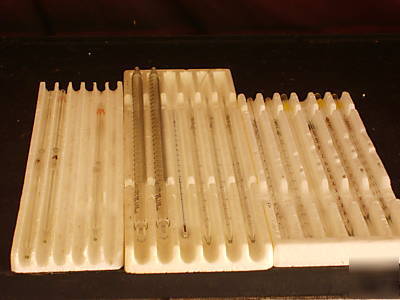 14 various pipettes and 1 lab thermometer
