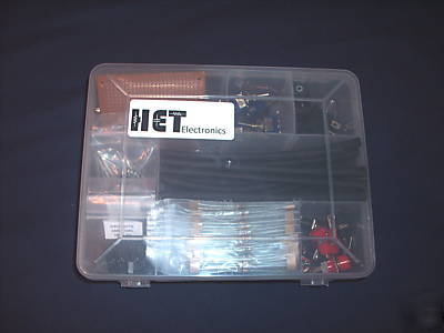 Assorted resistors, heat shrink, leds, pcb in a box