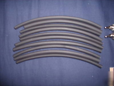 Assorted resistors, heat shrink, leds, pcb in a box