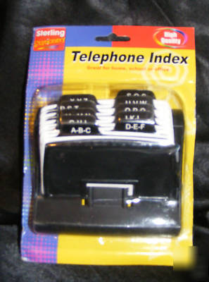 Telephone~address book~card a-z file index~home/office