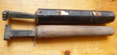 Decorative antique bookbinding corner tools.