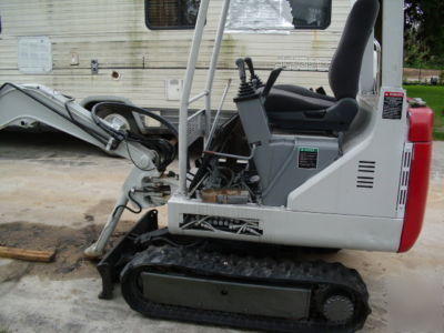Clean takeuchi mini excavator all systems work great 