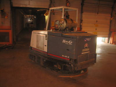 Advance hydro-cat ride on sweeper/scrubber lp powered