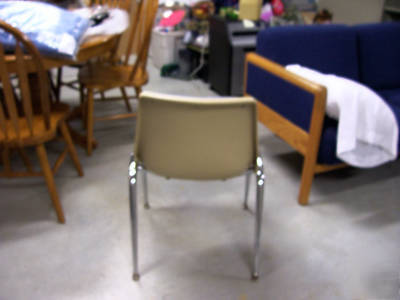 Molded cushioned stacking chairs 50 available