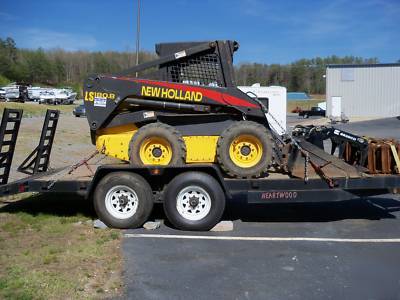 New 2005 holland skid steer LS180B w/ tandem trailer