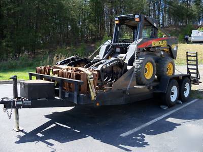 New 2005 holland skid steer LS180B w/ tandem trailer