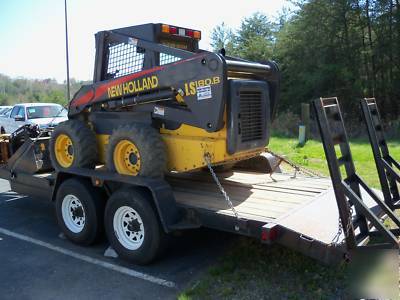 New 2005 holland skid steer LS180B w/ tandem trailer