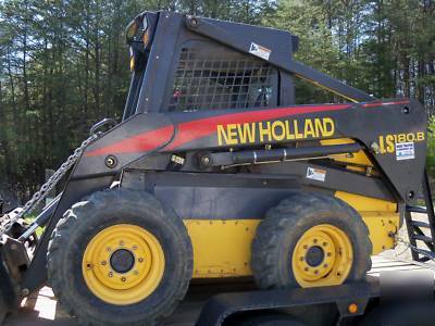New 2005 holland skid steer LS180B w/ tandem trailer