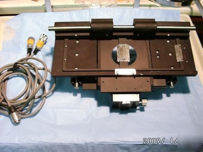 Microscope motion stage with yaskawa rotary controls
