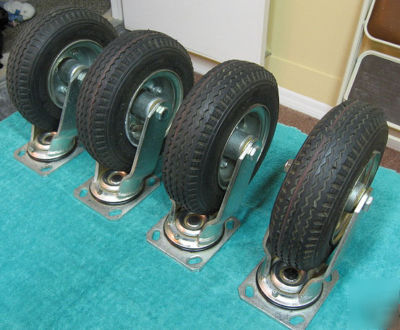 Four pneumatic 50PSI tube tire swivel casters wheels