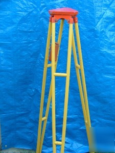 Wooden surveyor's tripod with brass top plate, 59