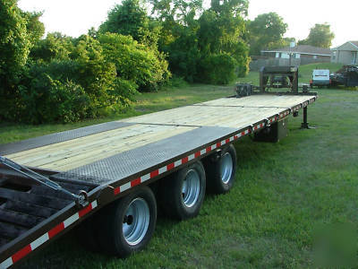Gooseneck trailer three, triple, axle flatbed 30K 38'