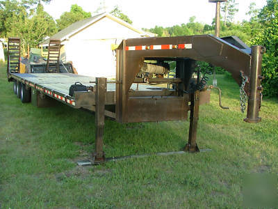 Gooseneck trailer three, triple, axle flatbed 30K 38'