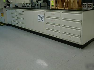 Laboratory cabinets 14â€™ long section electric & tops