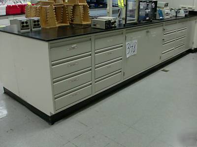 Laboratory cabinets 14â€™ long section electric & tops