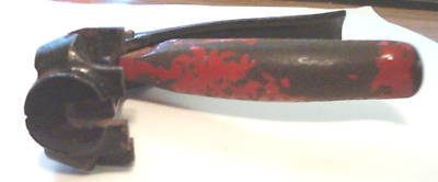 Vintage hand held metal rectangular punch leather ear