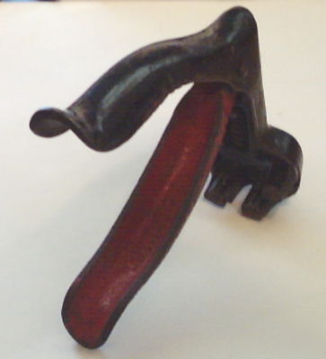 Vintage hand held metal rectangular punch leather ear