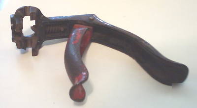 Vintage hand held metal rectangular punch leather ear