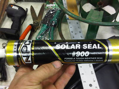 #900 solar seal rubber caulk-adhesive sealant/blk