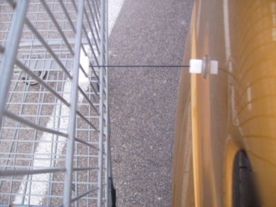 Secure grocery cart stop