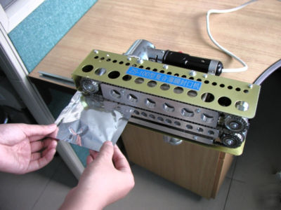  continuos plastic bag sealing machine