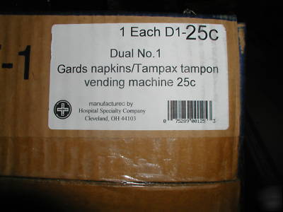Coin operated tampon/pad dispenser