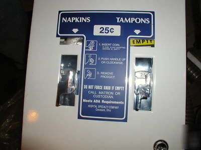 Coin operated tampon/pad dispenser