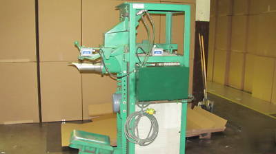 Auger type valve bag packer by stone container
