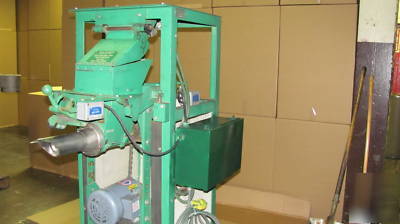 Auger type valve bag packer by stone container