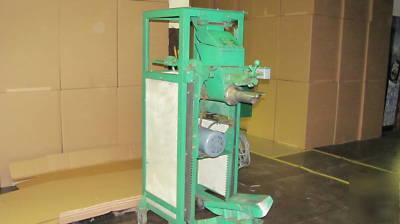 Auger type valve bag packer by stone container