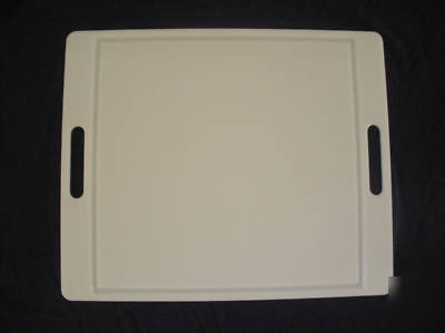 Larger size plastic cutting board with rubber feet