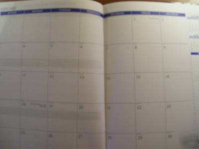 New 2010 monthly planner tan 7.5