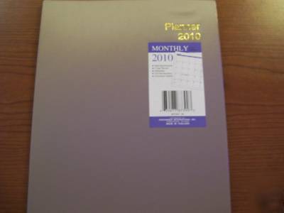 New 2010 monthly planner tan 7.5
