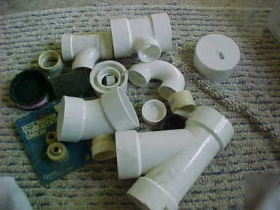 3 inch and 11/2 inch assorted fittings PVC1 4INCH cap