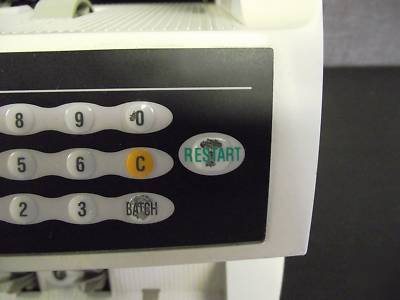 Glory 820 currency counter with counterfeit