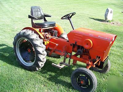 Powerking 2414 tractor with finish mower and implements