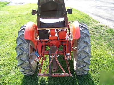 Powerking 2414 tractor with finish mower and implements