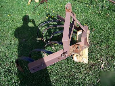 Powerking 2414 tractor with finish mower and implements